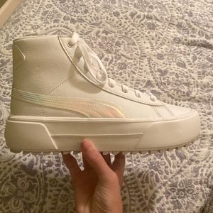 Brand new never been worn white puma shoes with iridescent detailing on the side